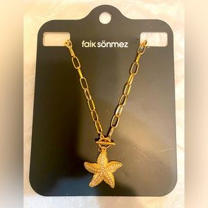 Faik  Sonmez designed star Shaped pendant necklace .